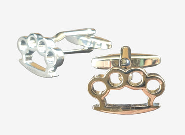 Two silver cufflinks with knuckle duster design on a white background
