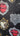 Decorative fabric with lace, floral, and portrait patterns on a black background