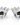 Two clear faceted crystal candleholders with a flower-like petal design and black square labels reading Handmade by Rogaska, shown on a white background.