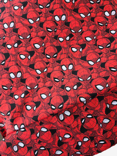 Close-up of Spider-Man Spider Sense comic-style cotton fabric pattern