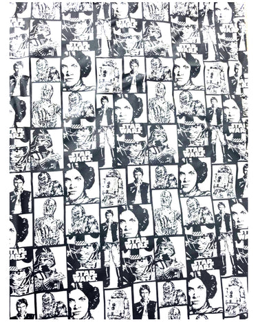Detailed view of monochrome Star Wars Heroic Rebels fabric with illustrated character panels and Star Wars logos