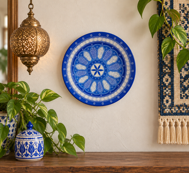 Turkish blue and white Ahmet ceramic wall plate displayed in a boho inspired interior - Planet Retro NZ