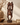 Vintage African hand-carved double-headed figure styled in an earthy interior