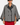 A woman modeling a gray and black patterned cape jacket with black trim, paired with a red pencil skirt and black heels, against a plain light gray studio background.