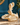 Vintage ceramic mermaid shell soap dish displayed against a teal blue wall