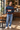 Vintage colourful striped wool blend knit size Medium styled with blue jeans in a cafe
