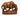 Vintage hand-carved wooden bull sculpture with lowered head and organic carved base