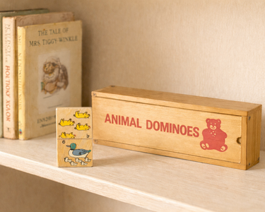 Vintage wooden animal dominoes set in original sliding box with illustrated animal tiles