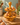 Vintage wooden two-tier egg holder styled in a warm retro kitchen setting