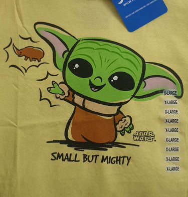 A yellow t-shirt with the image of the character Grogu from Star Wars The Mandalorian
